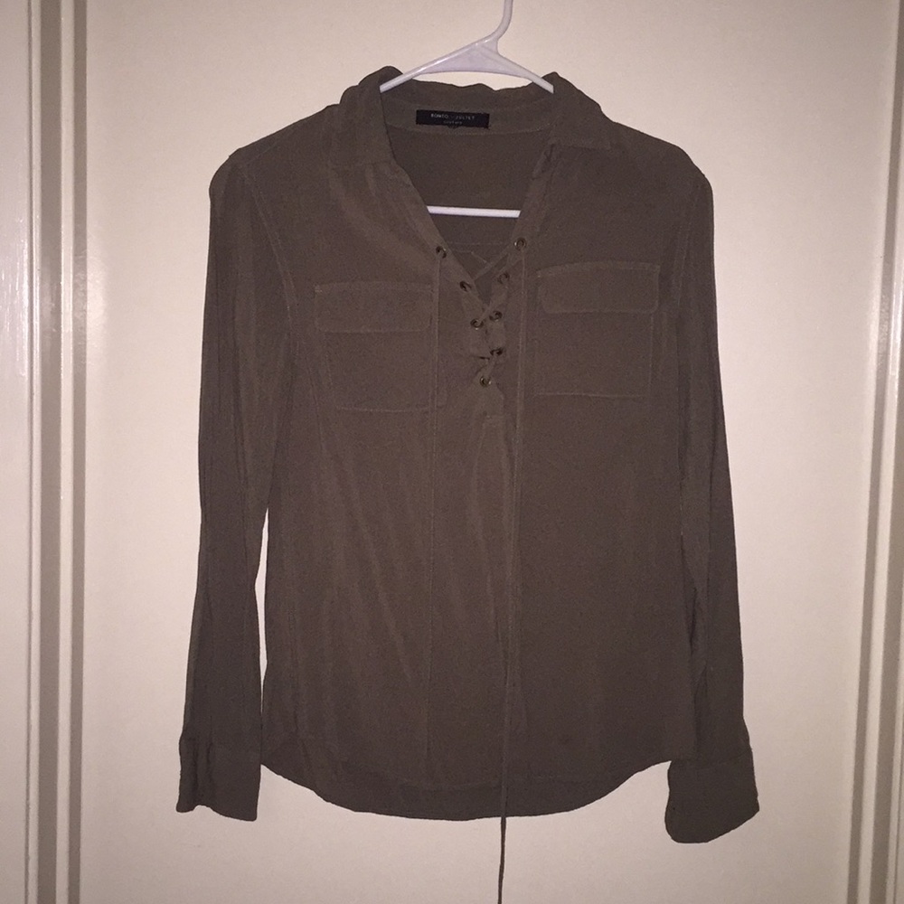Long sleeve lace up front top